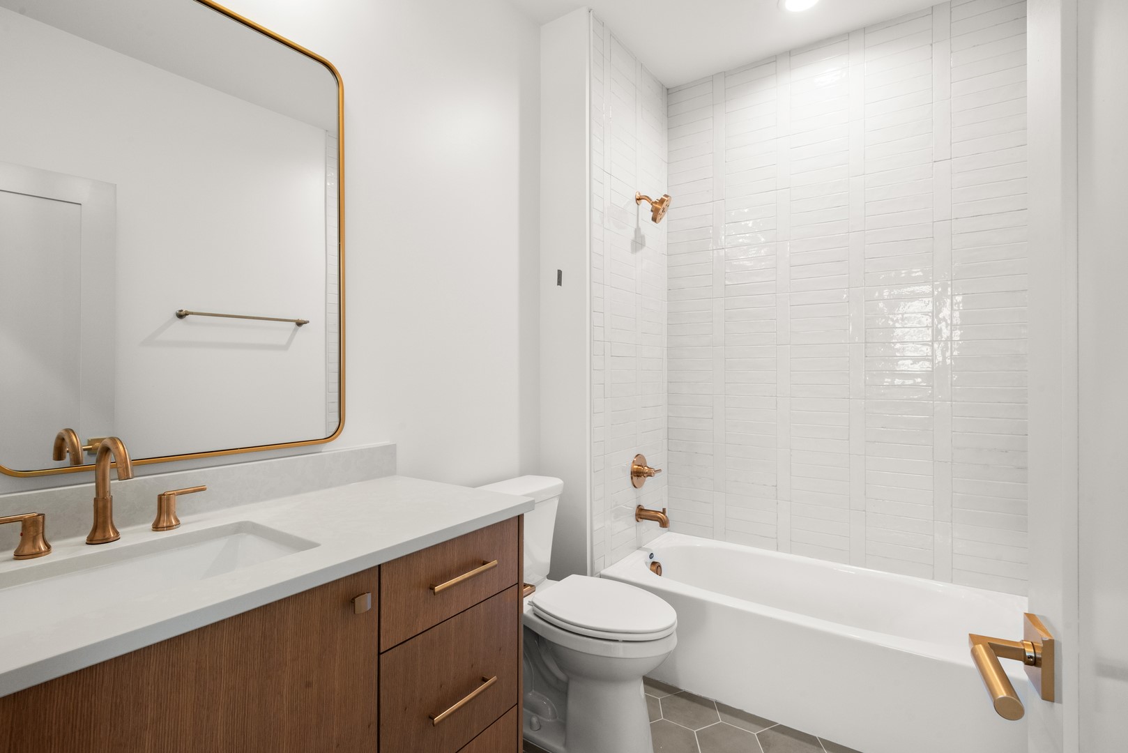 1310 Chantilly Lane Houston, TX 77018 - Photo 24 of 26 a bathroom with a sink a toilet and shower