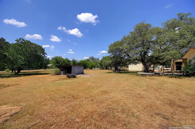 a view of outdoor space and yard
