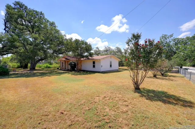 a fire hydrant in the middle of a field