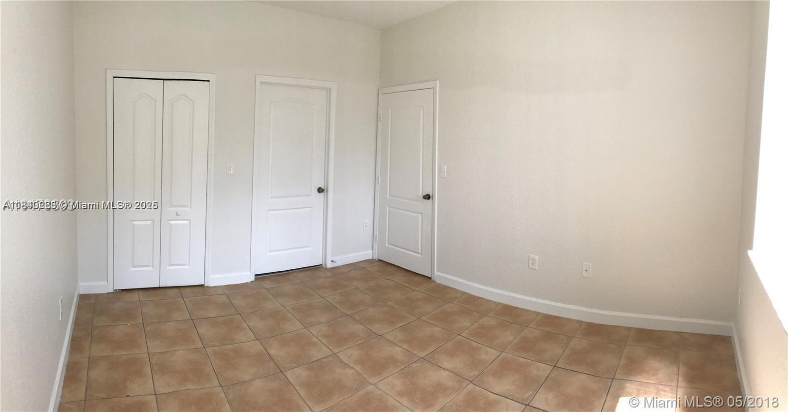 17720 Northwest 73rd Avenue, Unit 105 Hialeah, FL 33015 - Photo 5 of 27