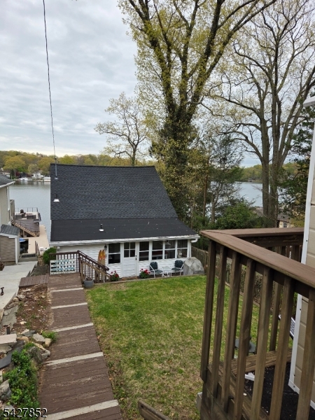 330 Lakeside Avenue Hopatcong, NJ 07821 - Photo 15 of 15 a front view of house with yard and trees around