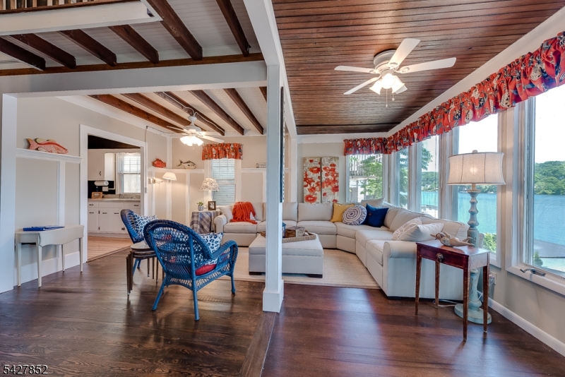 330 Lakeside Avenue Hopatcong, NJ 07821 - Photo 4 of 15 a living room with furniture and wooden floor