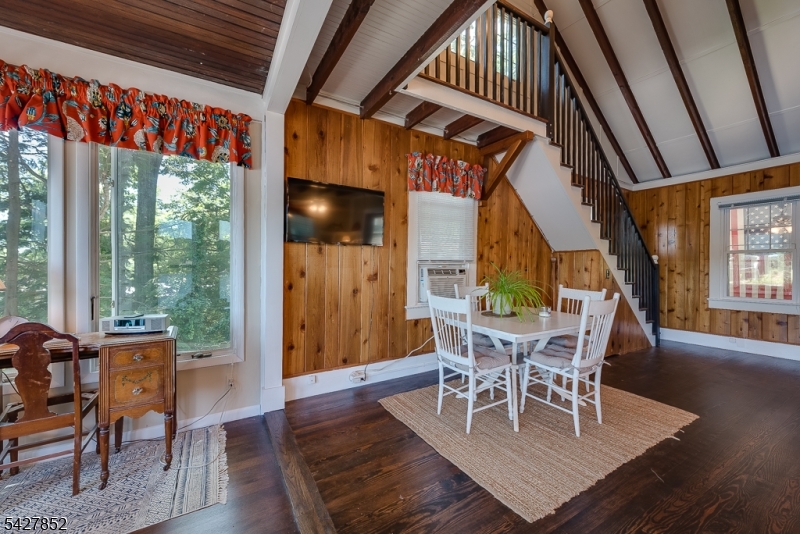 330 Lakeside Avenue Hopatcong, NJ 07821 - Photo 6 of 15 a view of a dining room with furniture window and wooden floor