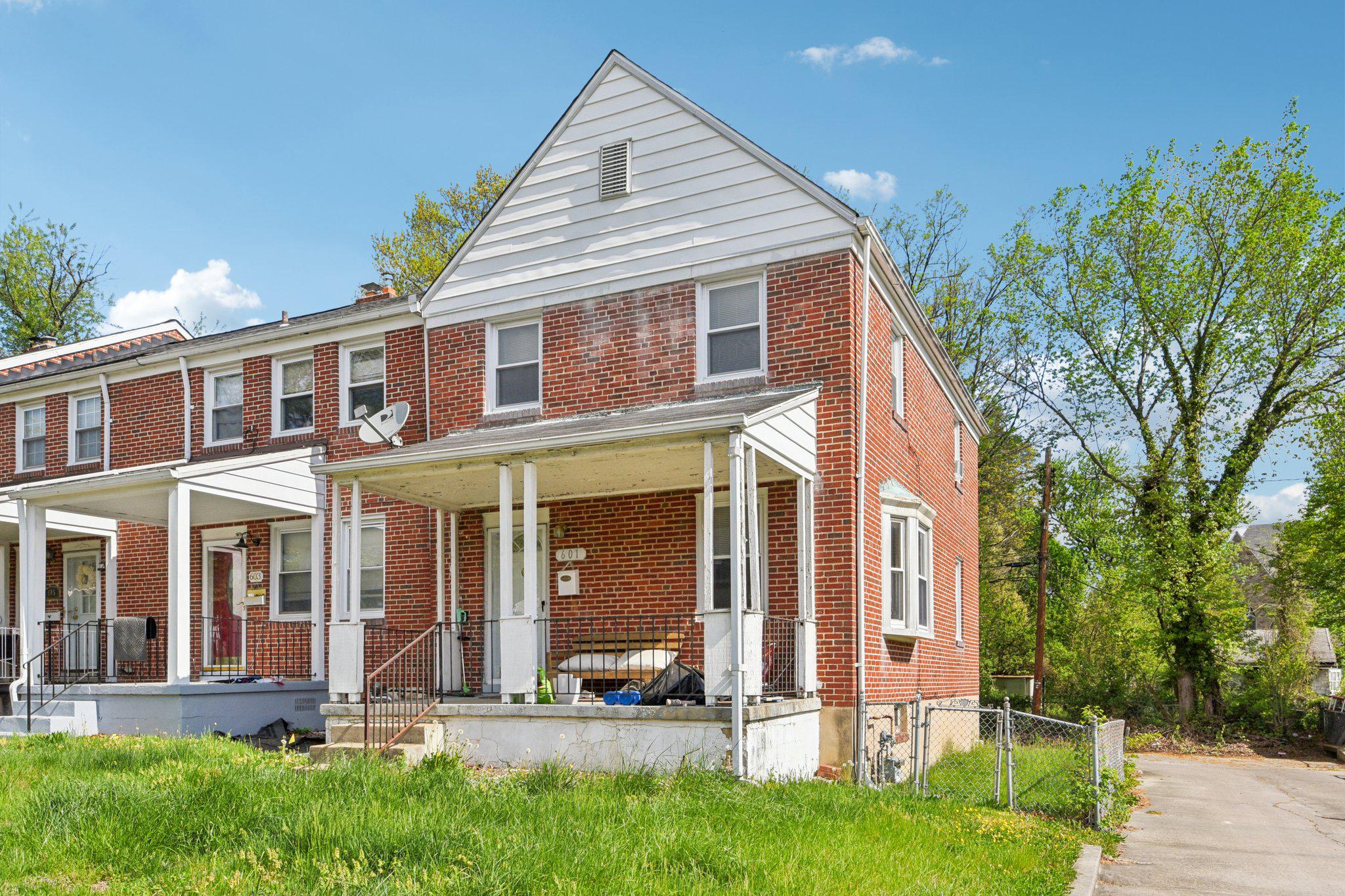 601 Braeside Road Baltimore, MD 21229 - Photo 1 of 24 Charming brick home with lush greenery.