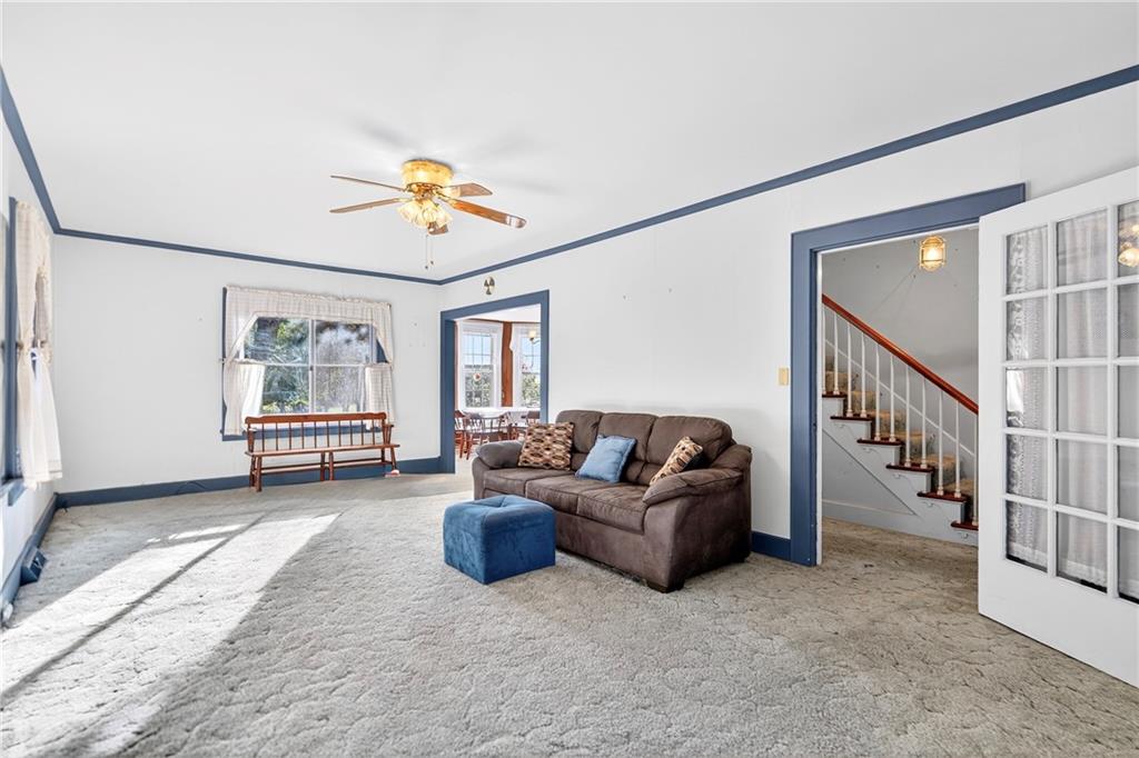 219 Meridian Road Butler, PA 16001 - Photo 16 of 39 a living room with furniture and windows
