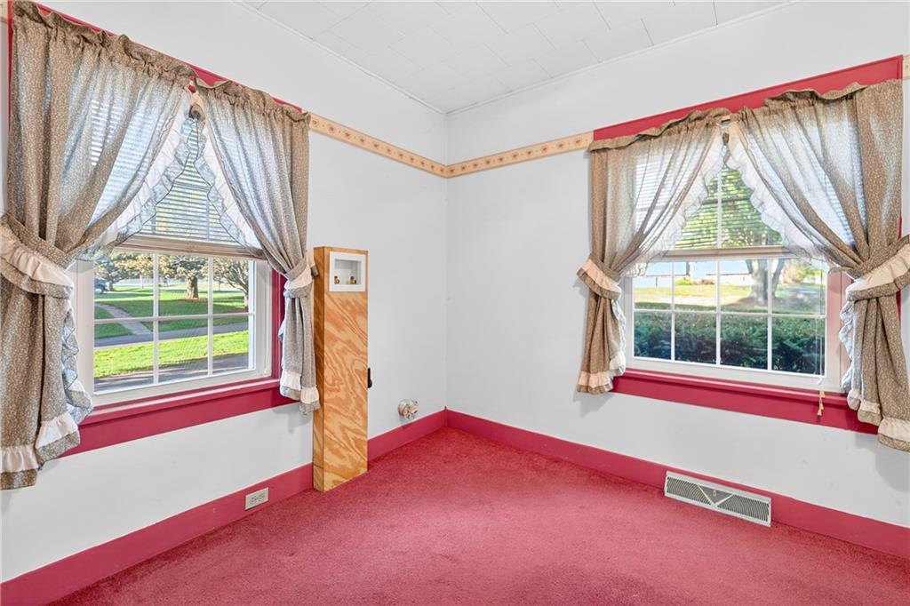 219 Meridian Road Butler, PA 16001 - Photo 21 of 39 an empty room with windows