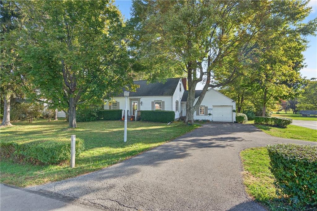 219 Meridian Road Butler, PA 16001 - Photo 39 of 39 a front view of a house with a yard and garage