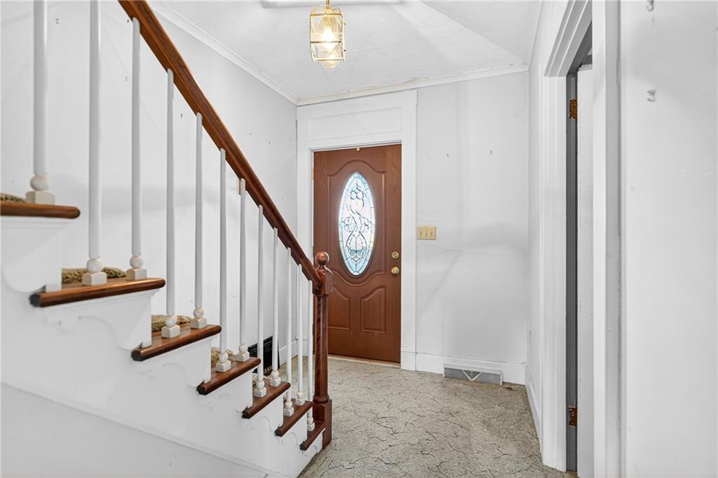 219 Meridian Road Butler, PA 16001 - Photo 4 of 39 a view of front door with stairs