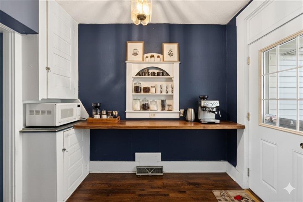 219 Meridian Road Butler, PA 16001 - Photo 6 of 39 a view of kitchen with sink and wooden floor