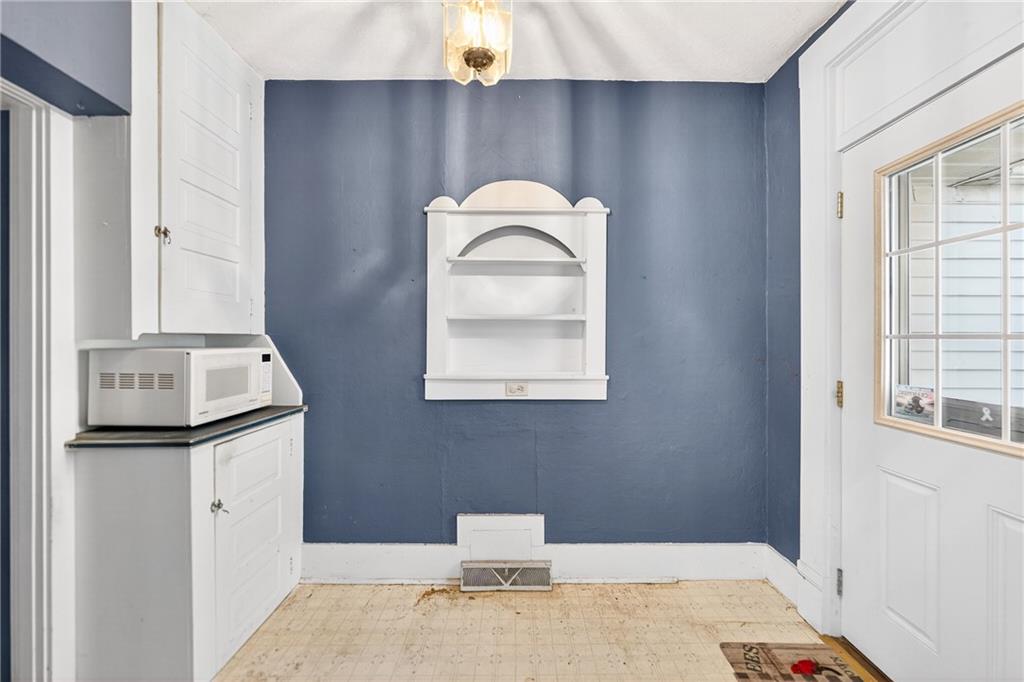 219 Meridian Road Butler, PA 16001 - Photo 7 of 39 a bathroom with a bathtub and a window