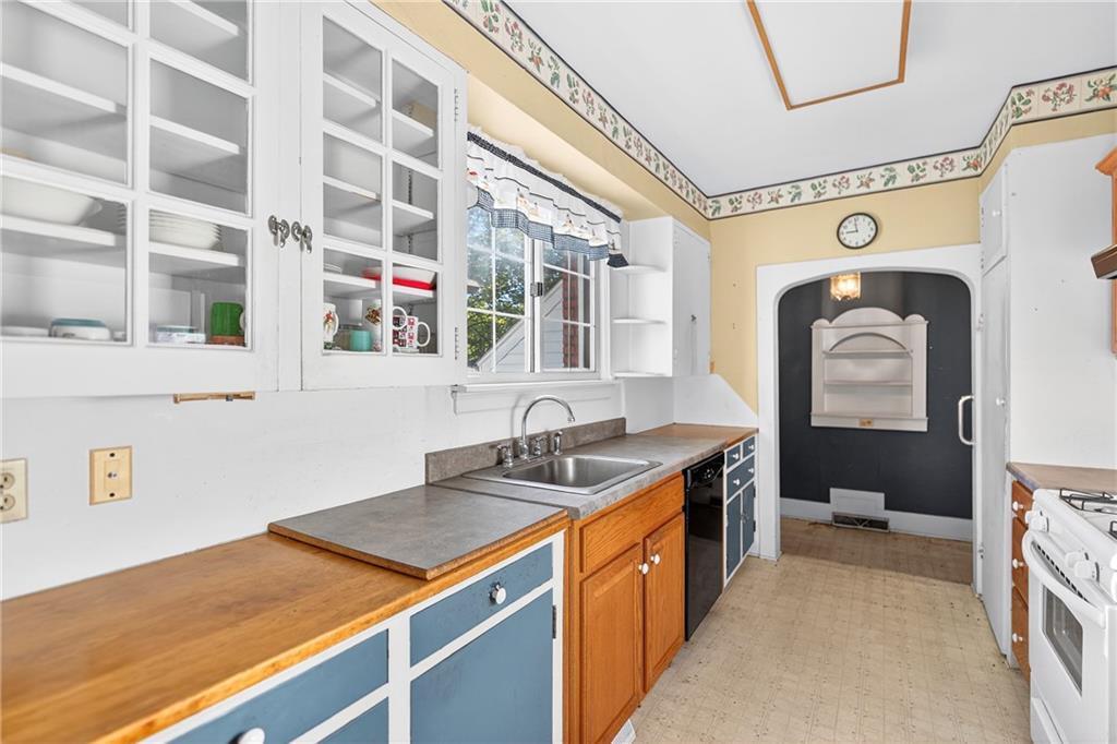 219 Meridian Road Butler, PA 16001 - Photo 10 of 39 a bathroom with a sink and a mirror