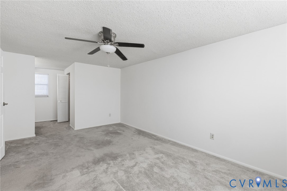 9643 Snowhill Road Richmond, VA 23235 - Photo 16 of 30 a view of a ceiling fan in a room