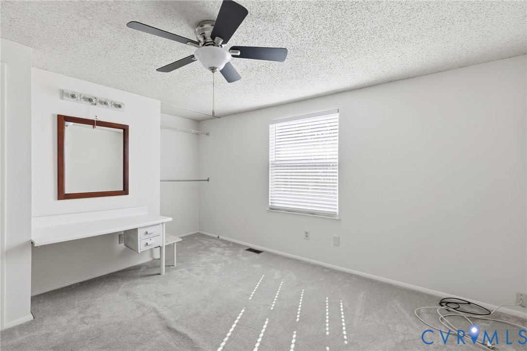 9643 Snowhill Road Richmond, VA 23235 - Photo 19 of 30 a view of an empty room with a window