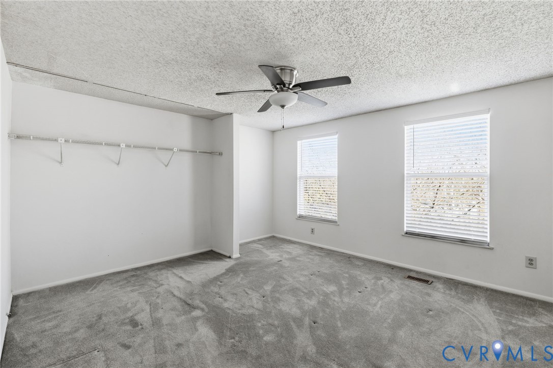 9643 Snowhill Road Richmond, VA 23235 - Photo 20 of 30 a view of an empty room with a window