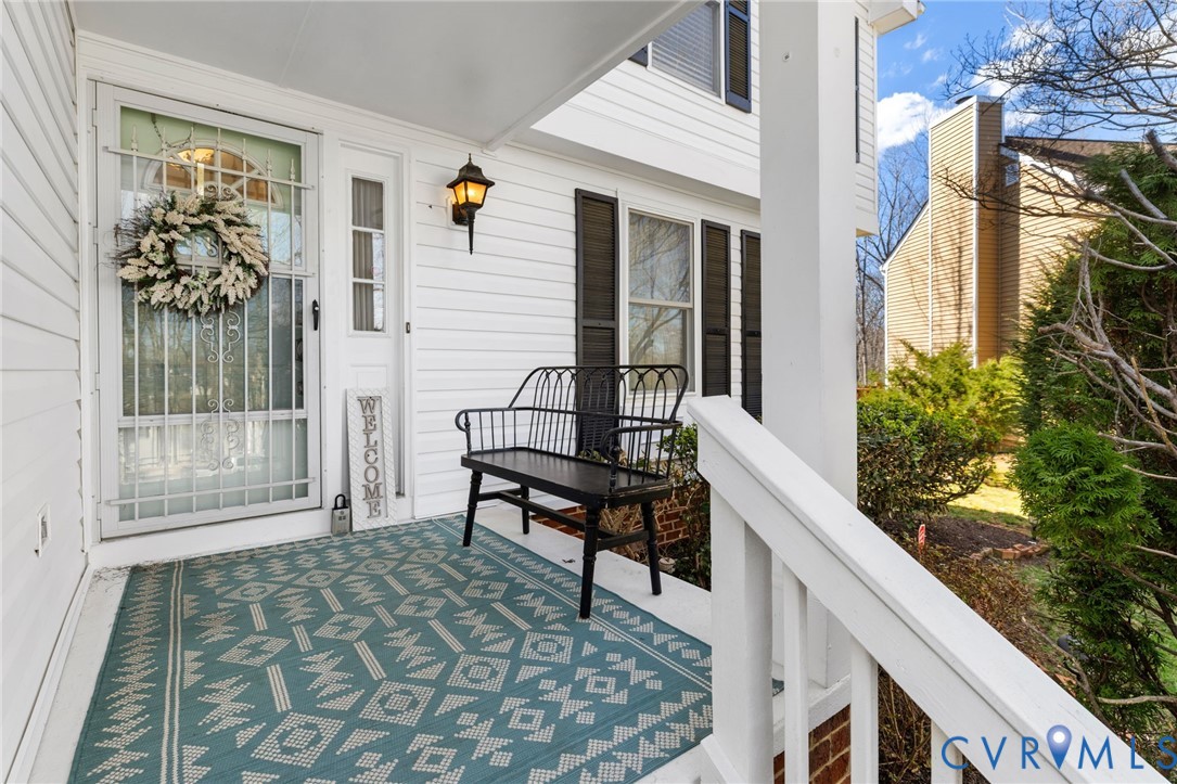 9643 Snowhill Road Richmond, VA 23235 - Photo 2 of 30 a balcony view with a outdoor seating space