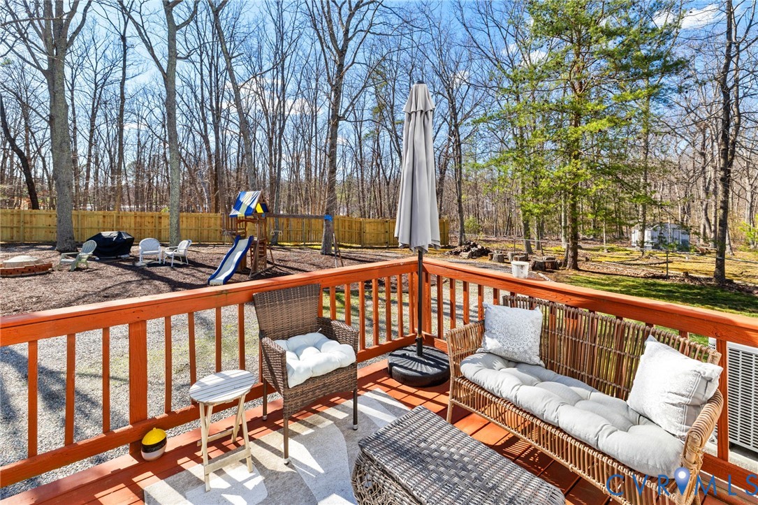 9643 Snowhill Road Richmond, VA 23235 - Photo 26 of 30 a view of a balcony with chairs
