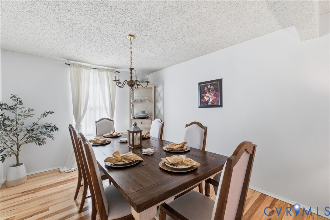 9643 Snowhill Road Richmond, VA 23235 - Photo 6 of 30 a dining room with furniture and window