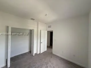 an empty room with closet