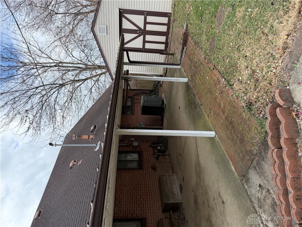 4867 Rittenhouse Drive Dayton, OH 45424 - Photo 11 of 17 This property features durable brick construction and a convenient shed for extra storage.