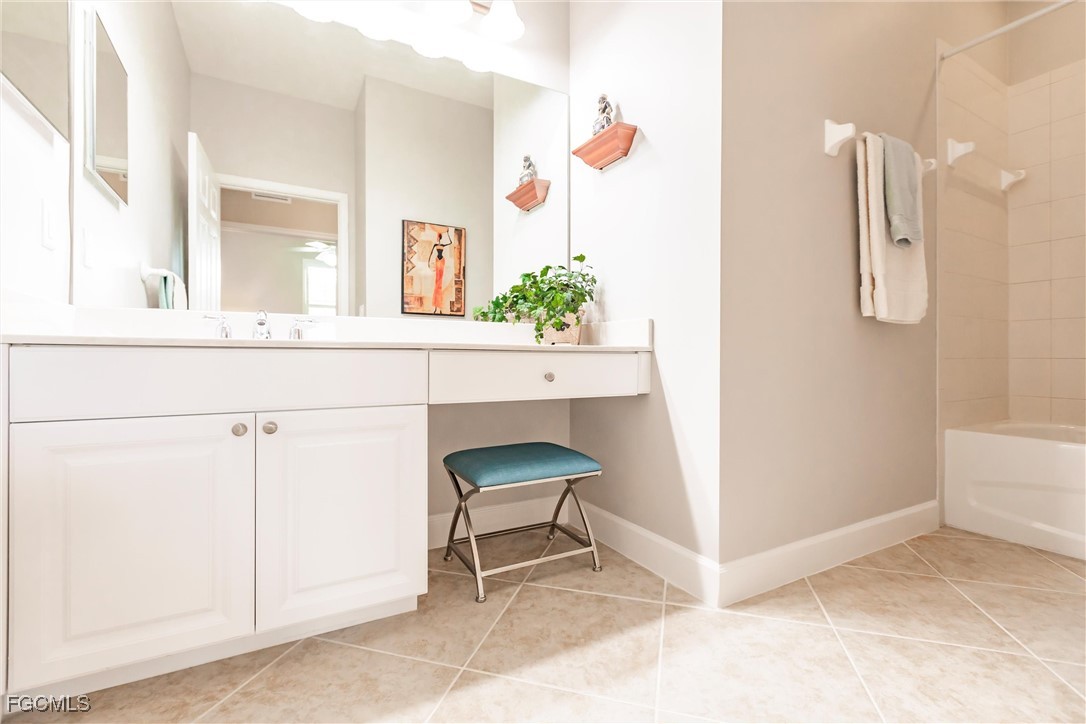 3121 Meandering Way, Unit 201 Fort Myers, FL 33905 - Photo 27 of 39 a living room with furniture and a potted plant