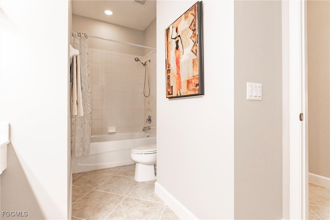 3121 Meandering Way, Unit 201 Fort Myers, FL 33905 - Photo 28 of 39 a bathroom with a toilet sink and shower