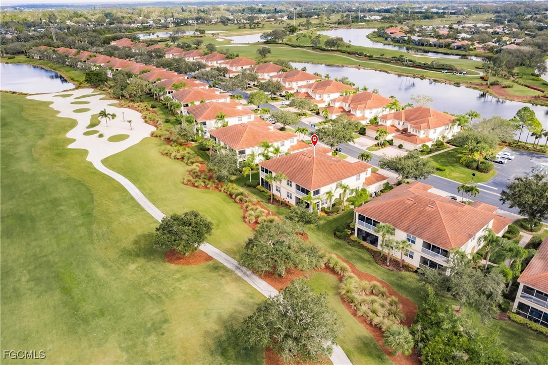 3121 Meandering Way, Unit 201 Fort Myers, FL 33905 - Photo 34 of 39 an aerial view of residential houses with outdoor space