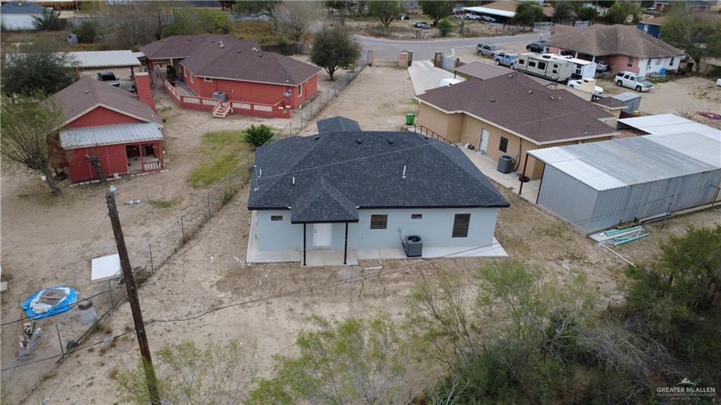 4195 Chapotito Street Rio Grande City, TX 78582 - Photo 13 of 15 an aerial view of multiple houses with a yard