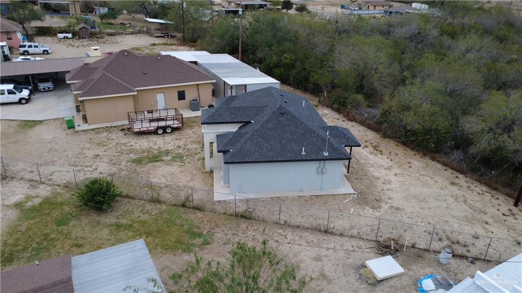 4195 Chapotito Street Rio Grande City, TX 78582 - Photo 14 of 15 an aerial view of a house with a yard