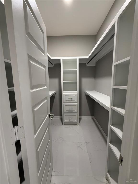 4195 Chapotito Street Rio Grande City, TX 78582 - Photo 6 of 15 a view of an empty walk in closet