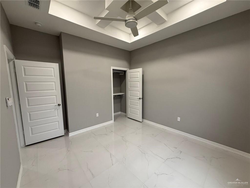 4195 Chapotito Street Rio Grande City, TX 78582 - Photo 8 of 15 an empty room with closet and natural light