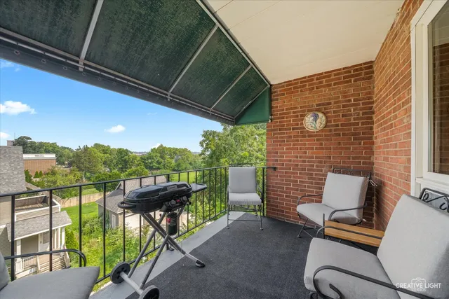 a view of a chairs in the balcony