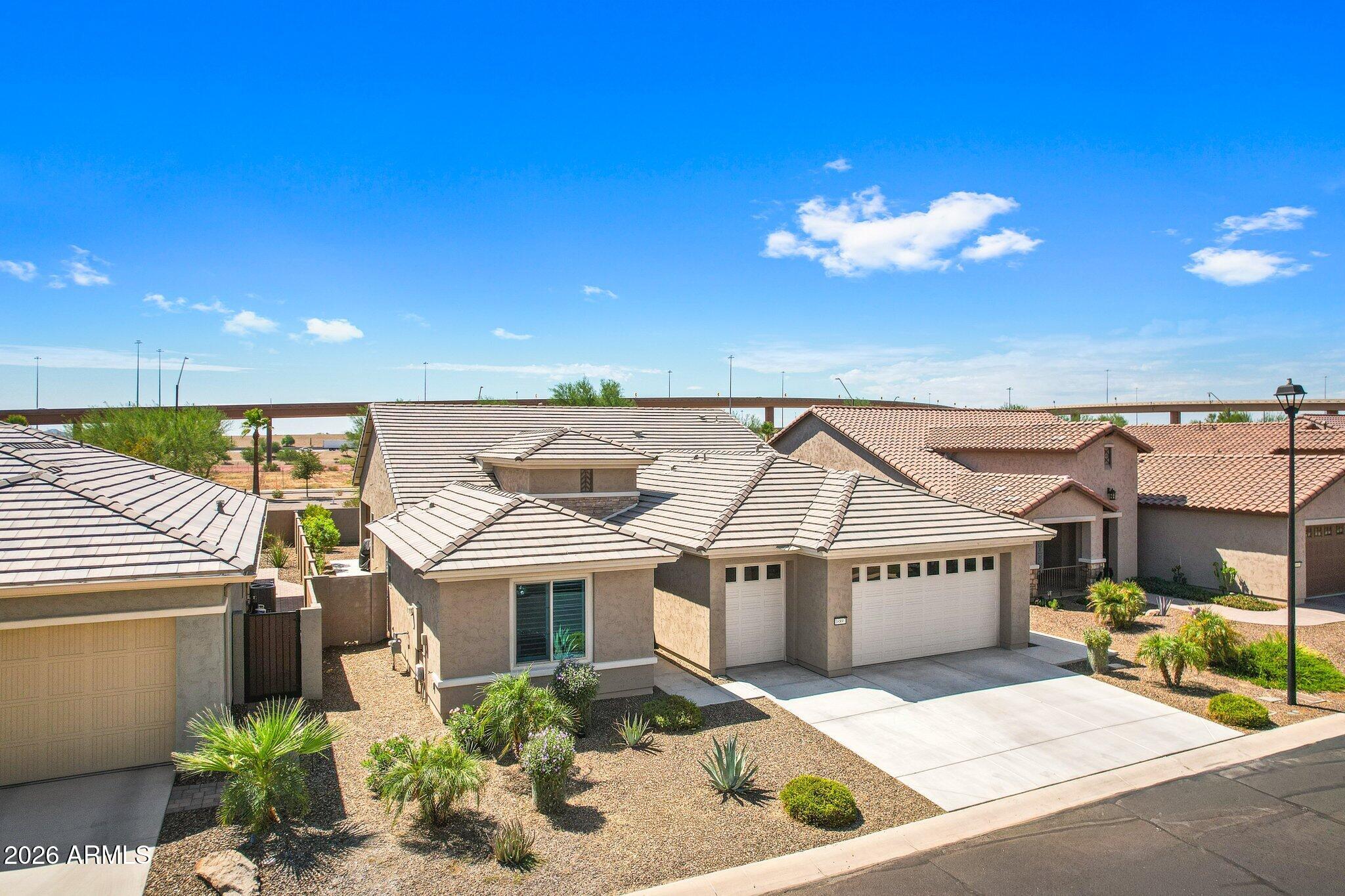 16897 West Almeria Road Goodyear, AZ 85395 - Photo 44 of 51 Three-Car Garage Home