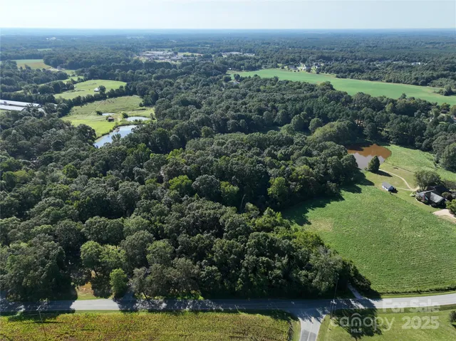a view of water heater and wooden floor