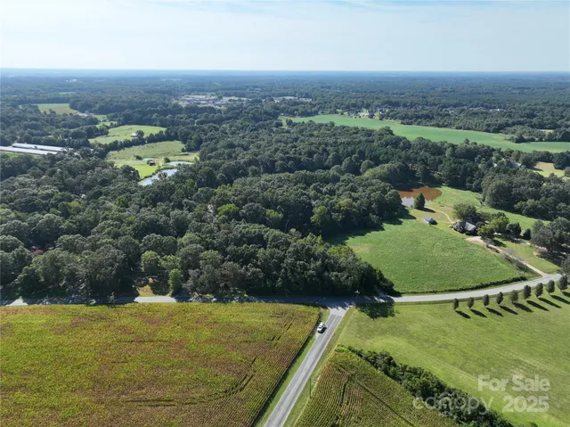 an aerial view of residential house with outdoor space