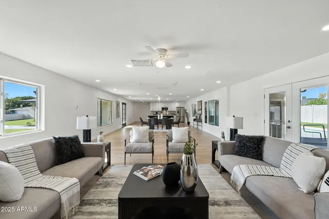 a living room with furniture and a couch