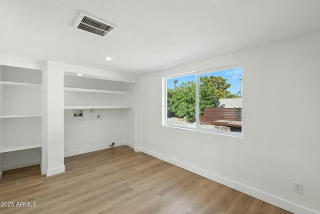 an empty room with windows