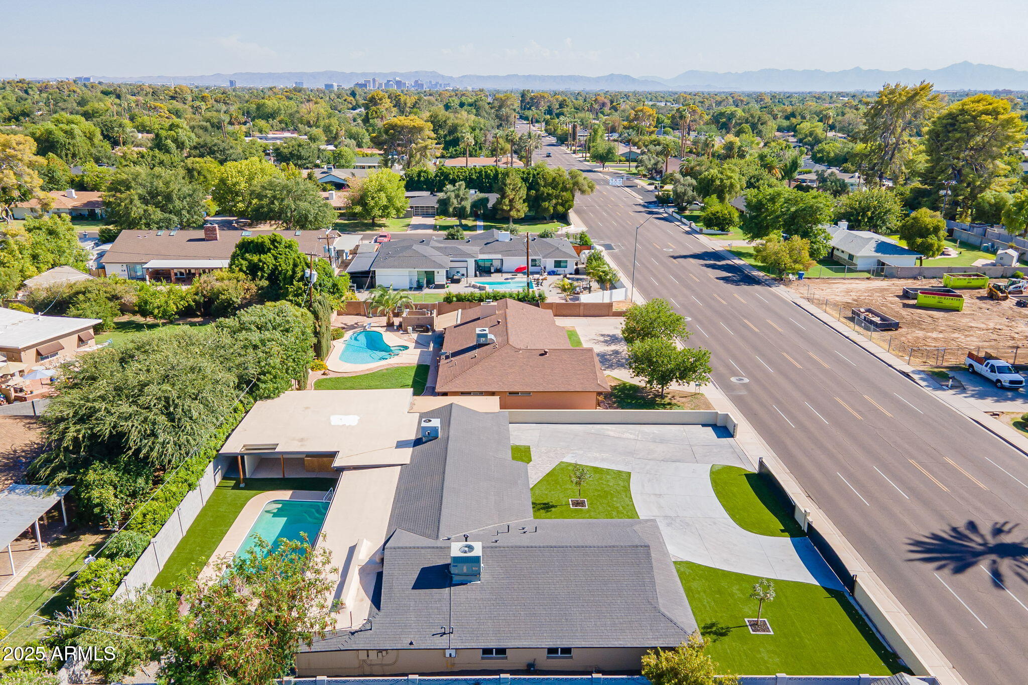 7637 North 7th Avenue Phoenix, AZ 85021 - Photo 55 of 57 an aerial view of house with yard swimming pool and outdoor seating