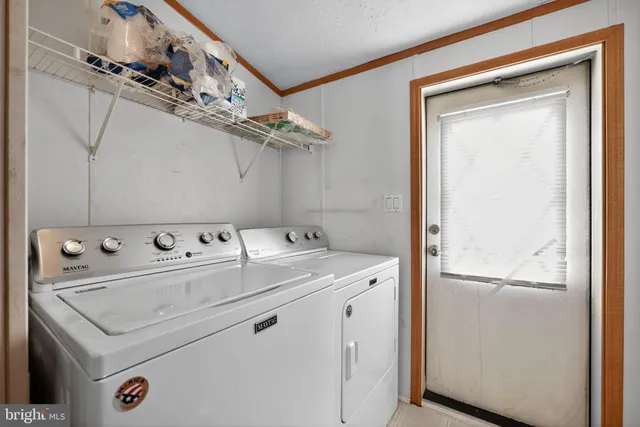 a house view with swimming pool in front of it