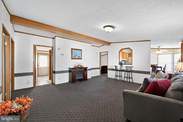 a kitchen with a sink a stove and cabinets
