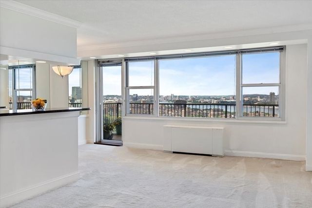 a view of living room with a large window