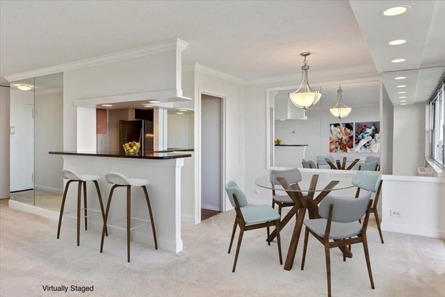 a view of a dining room with furniture