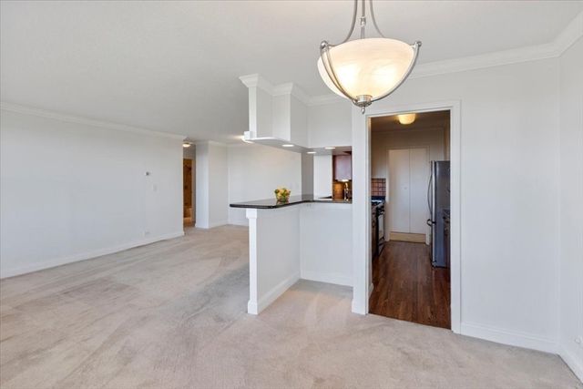 a view of a kitchen with a sink