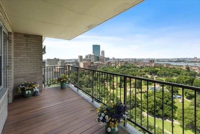 a view of balcony with furniture