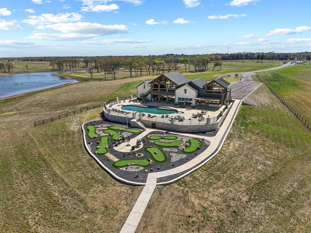 237 Lakeshore Terrace Windom, TX 75492 - Photo 29 of 35 a view of a swimming pool with lounge chair