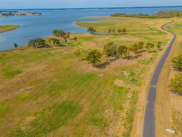 a view of a swimming pool with an ocean view