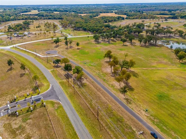 a view of a swimming pool with an ocean view