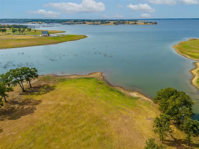 a view of a swimming pool and an outdoor space