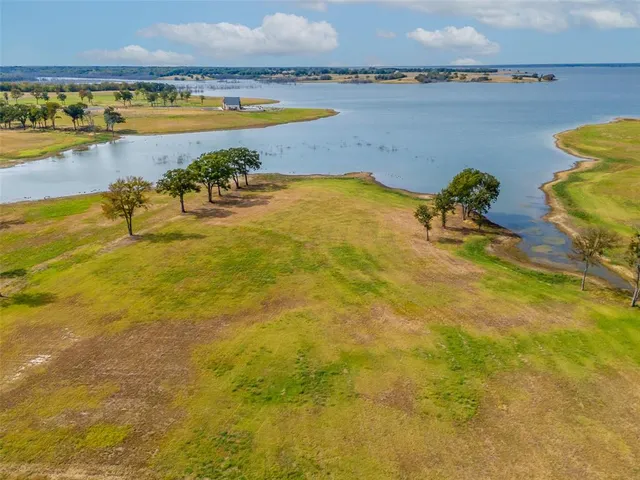 a view of a swimming pool and an outdoor space
