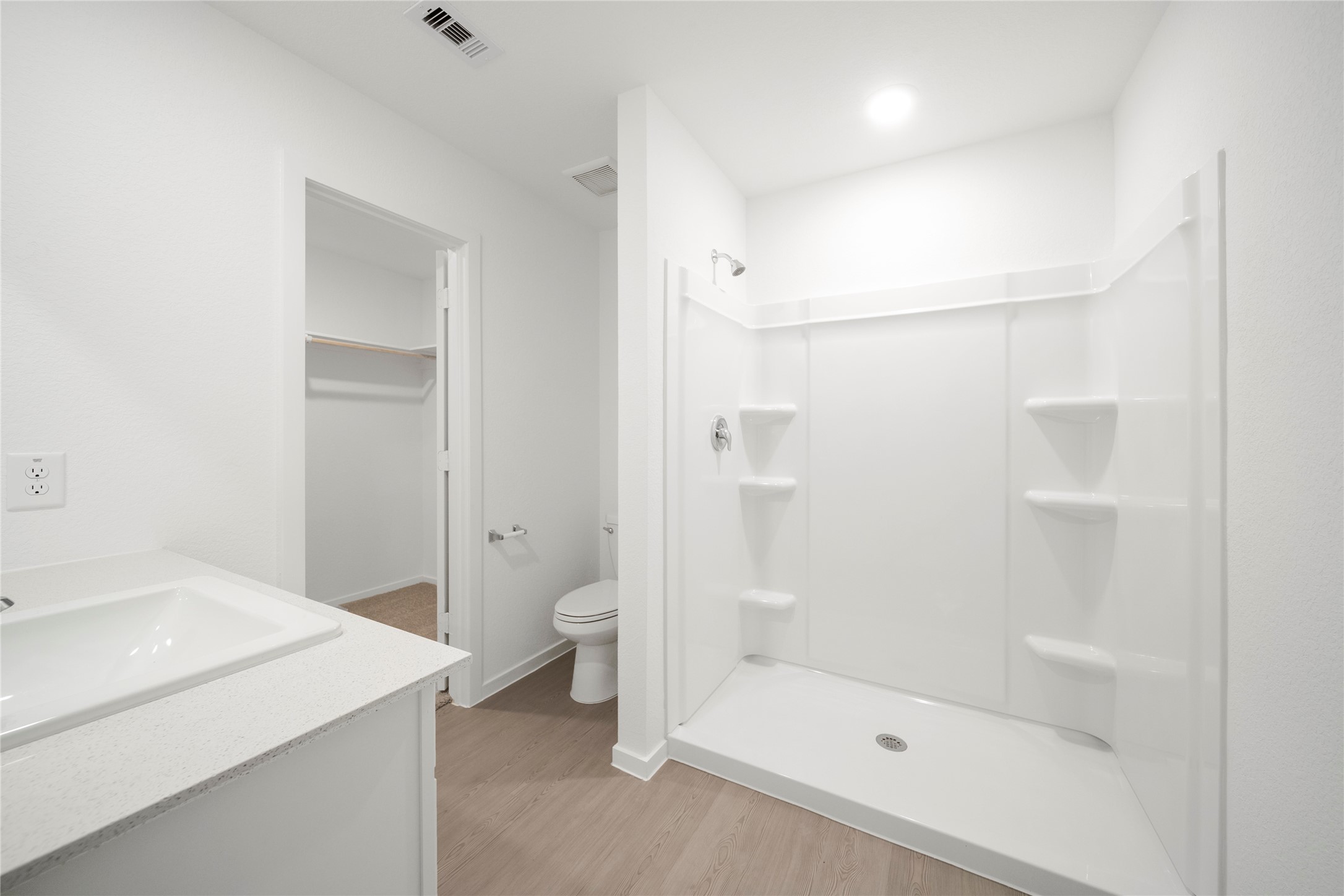 31436 Moore Road Magnolia, TX 77354 - Photo 15 of 25 a bathroom with a sink a toilet and shower