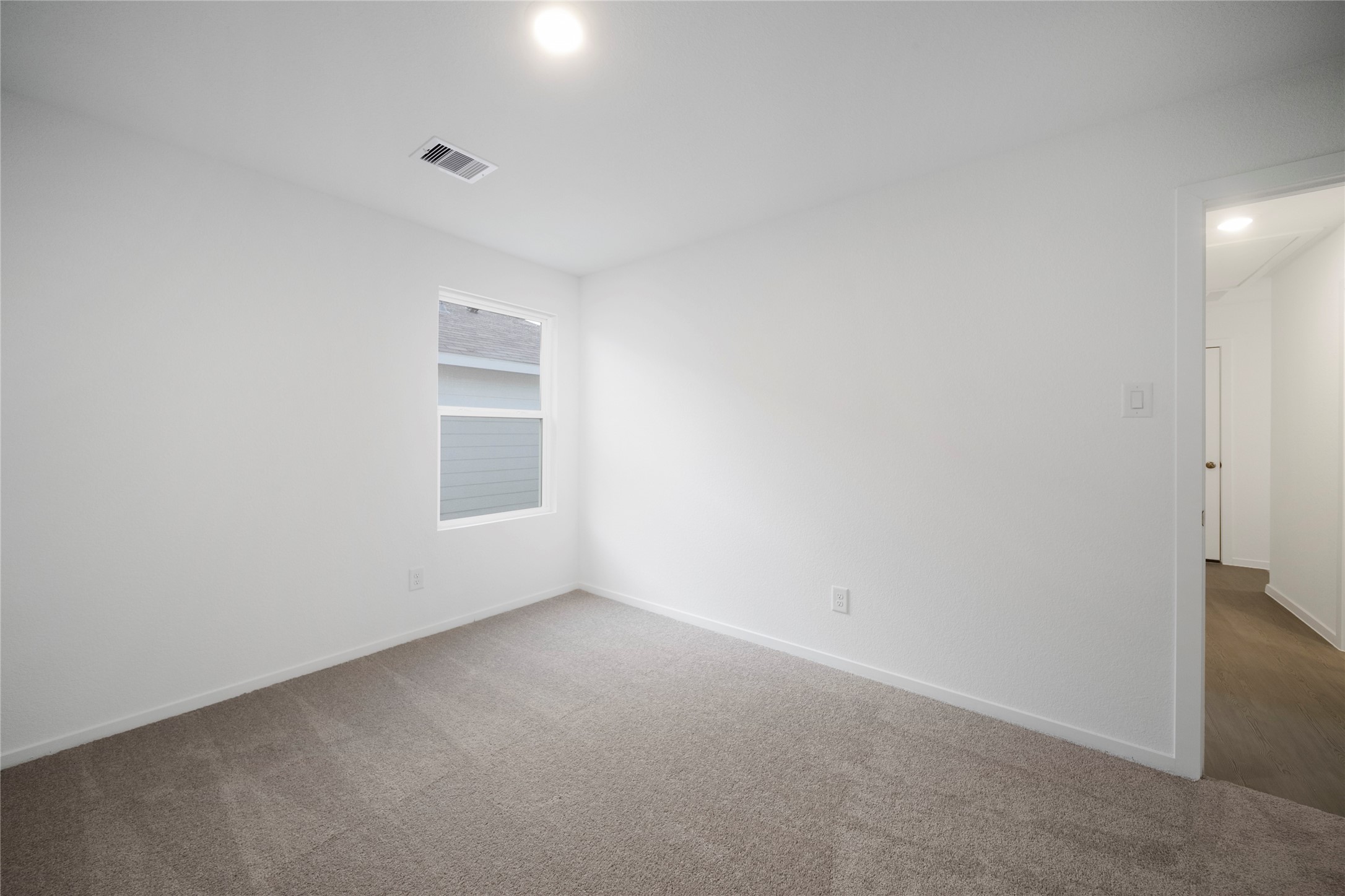 31436 Moore Road Magnolia, TX 77354 - Photo 18 of 25 a view of an empty room with a window